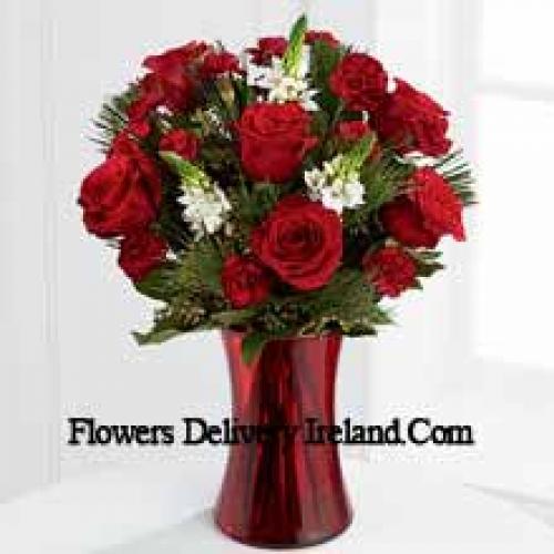 Roses and Assorted Greenery in Red Vase